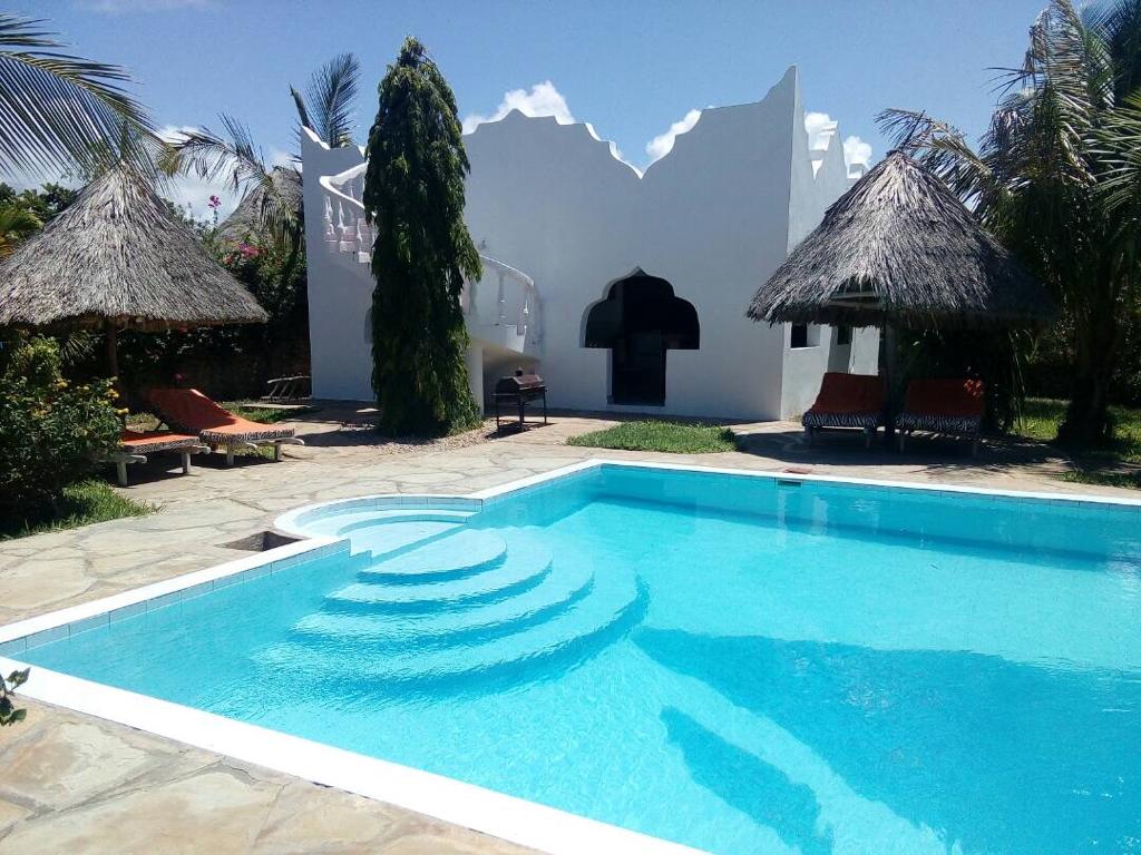 1/4 acre plot with two bedroom villas for sale in Kwale