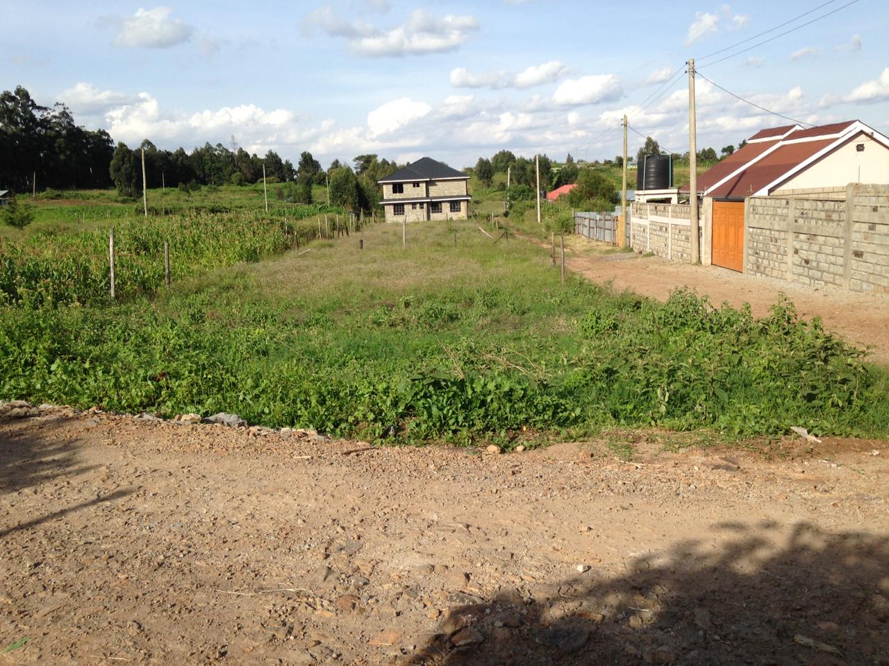 1/2 acre corner plot on distress sale in Kikuyu Kamangu.